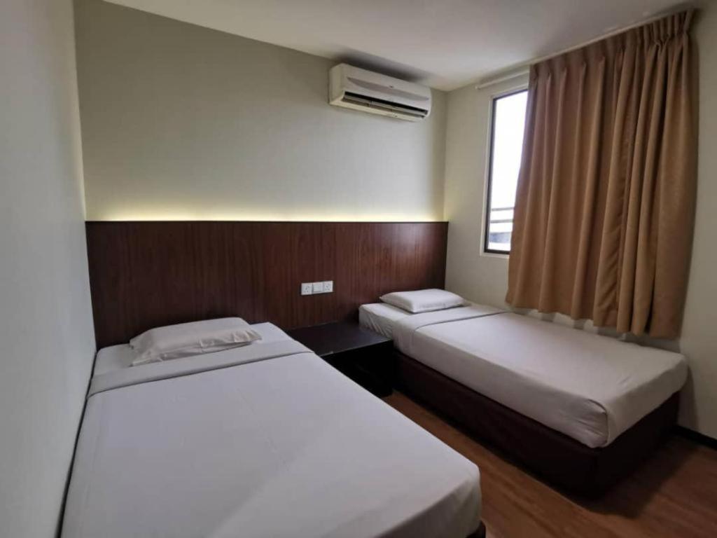 Hotel Holiday Кота-Кинабалу Экстерьер фото
